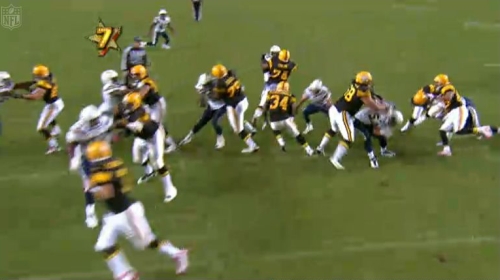 Mendenhall starts his cut to the left. Look at the great blocking here with only Weddle free as designed.